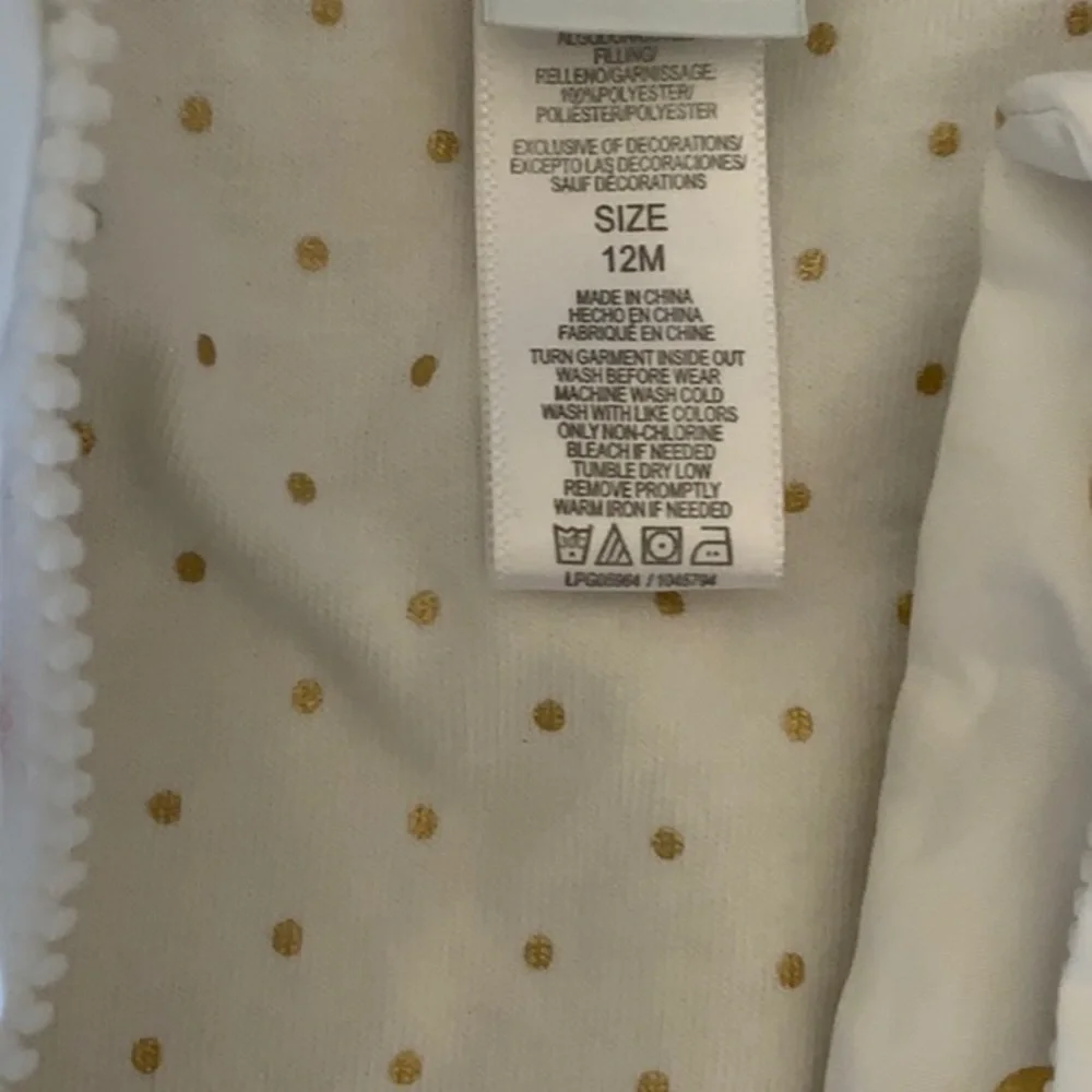 White Jackets with gold circles. Puffy. Like new. size = 12 months